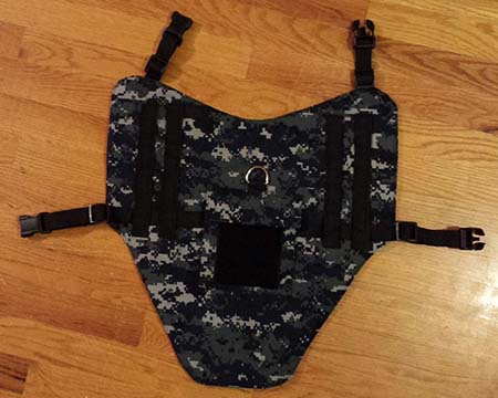 Dog wearing a US Navy digital fabric service dog vest.